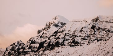 Vista of a snowy mountain range